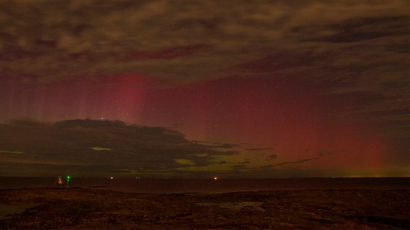 A red and green aurora over Port Phillip Bay