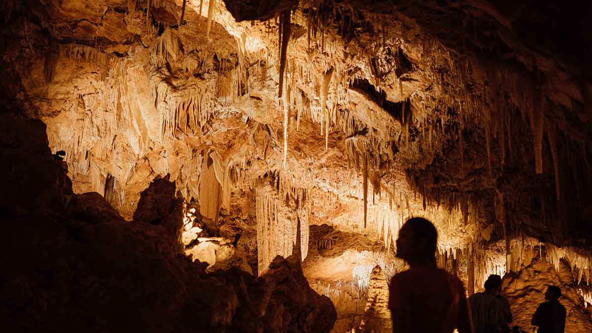 Bright lights shining on a cave