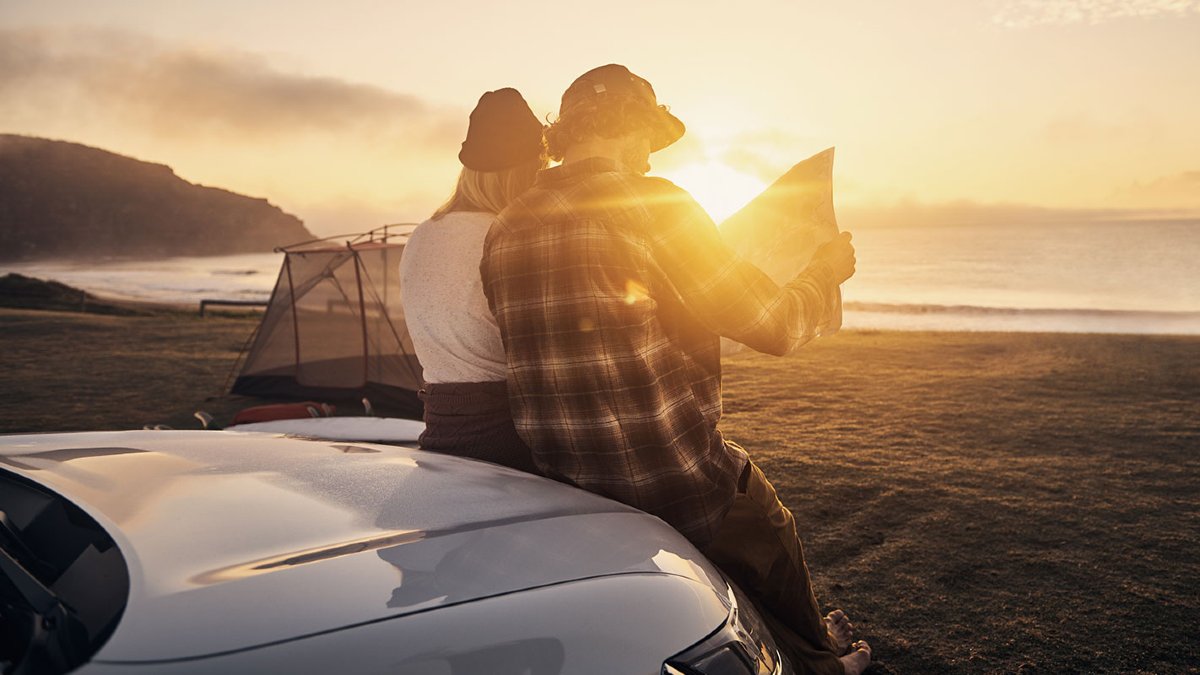 Couple-on-a-roadtrip-beach-1200x675-feature