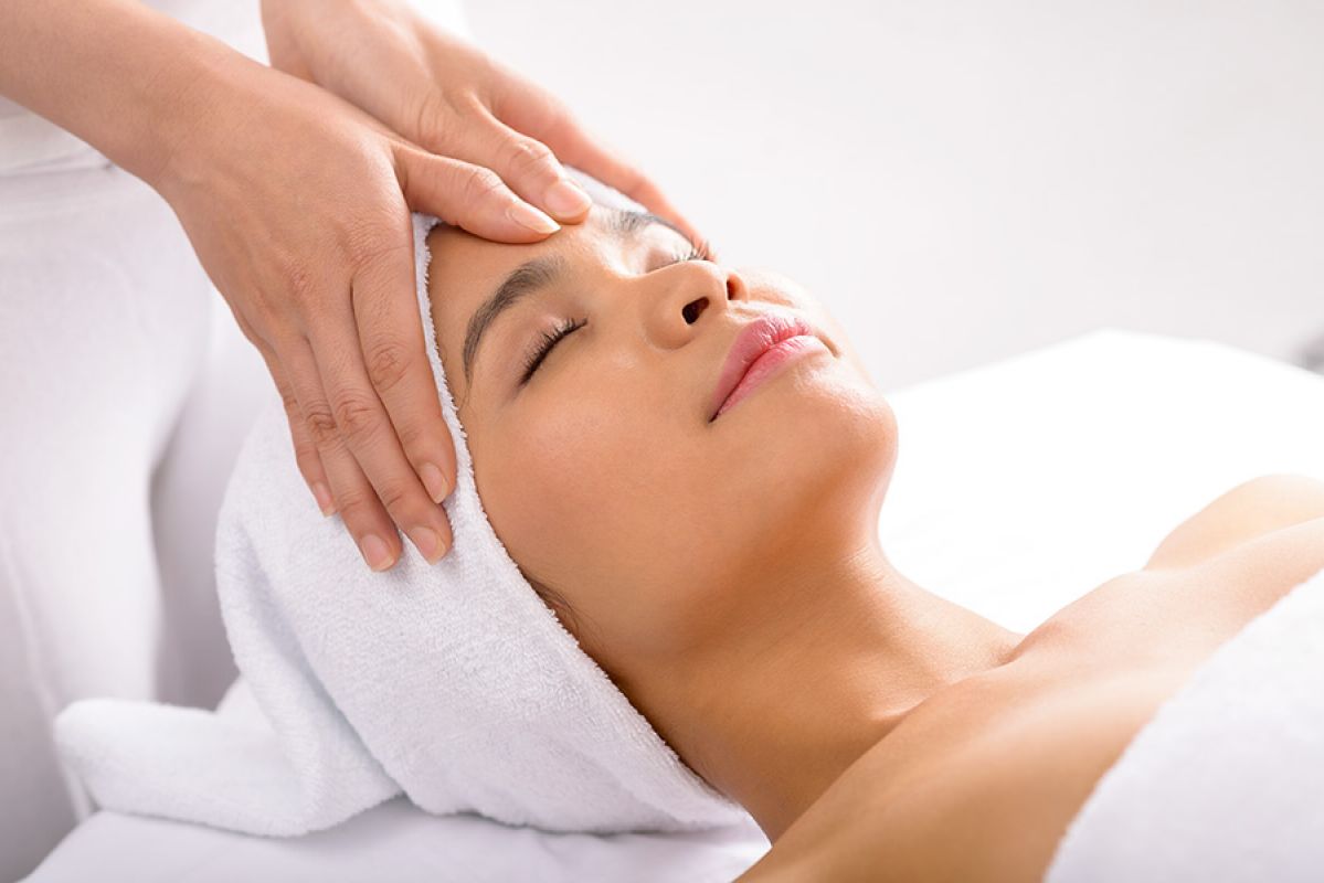 Woman receiving skin treatment