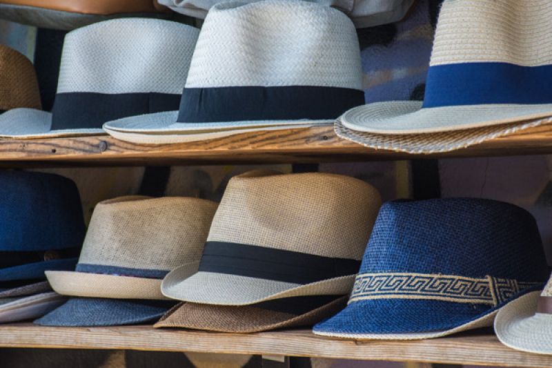 An array of hats on display for sale RACV Seniors Travel Insurance