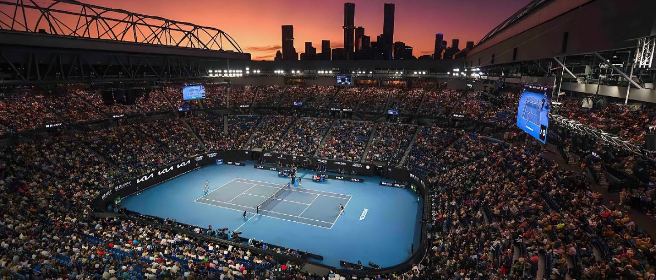 Australian-Open-Tennis-2023-Morgan-Hancock-via-Visit-Victoria-1400x600 large crowd watching tennis at sunset with city skyline in background