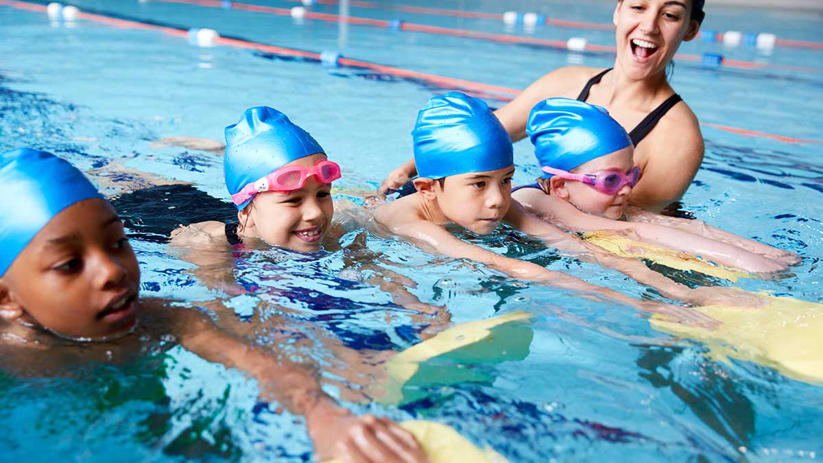 Children in pool during swimming lesson