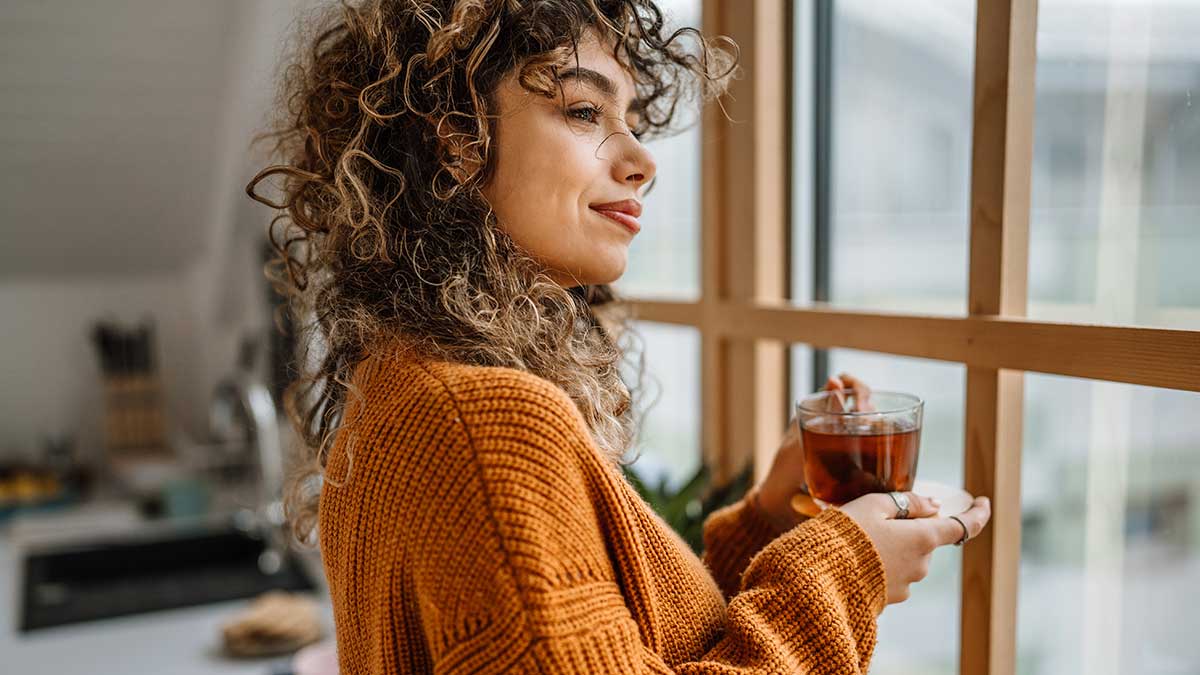 woman drinking a cold brew