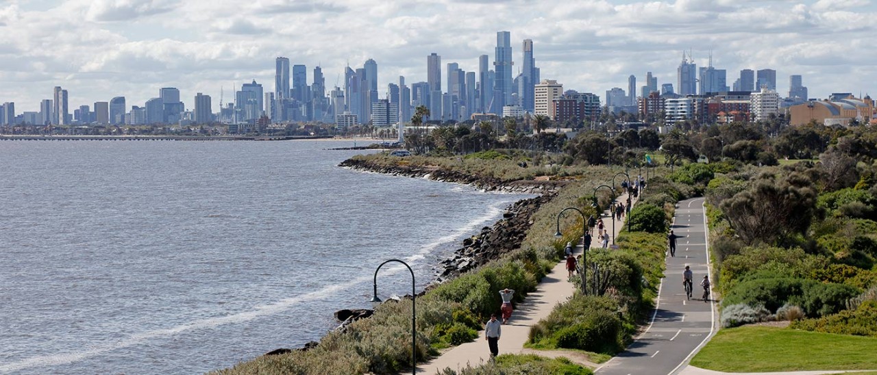 Melbourne-Bay-Trail-Point-Ormond-Elwood-Getty-1435711354-banner-1400x600 View from Point Ormond in Elwood showing Port Phillip Bay, pedestrians and cyclists on coastal paths with Melbourne city skyline behind